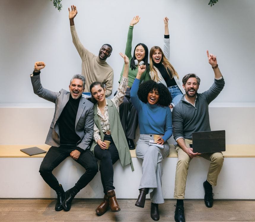 A group of colleagues celebrating together